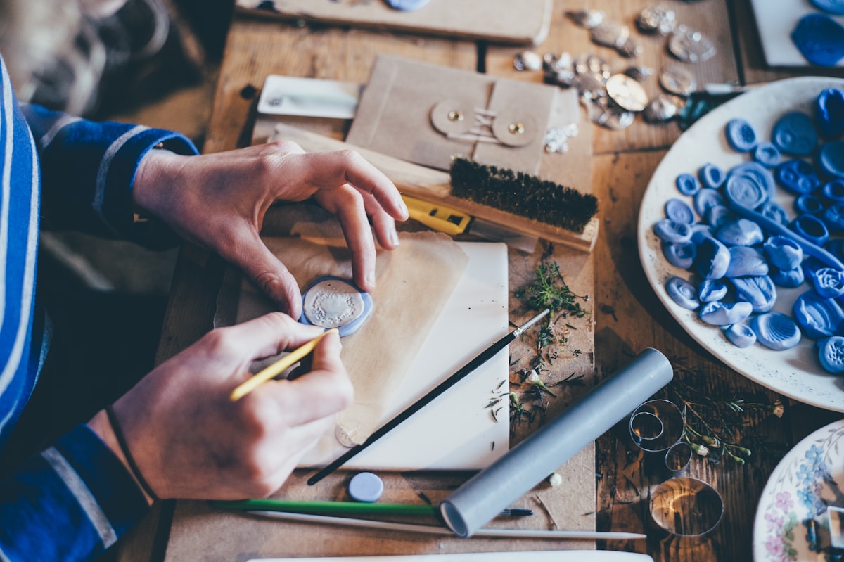 Artisan hands at work in the Makes Belief workshop